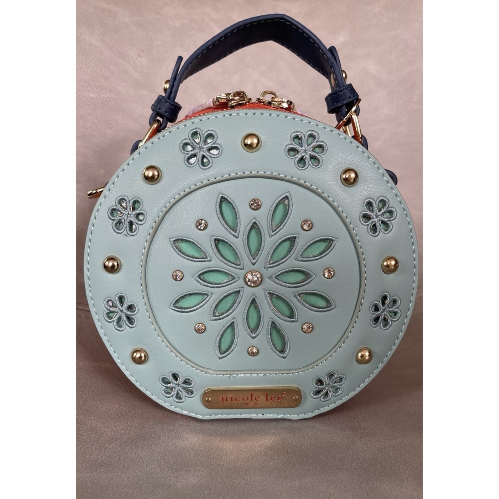 Nicole Lee USA P11557 Round Canteen Crossbody Bag Blue Floral Cutout NWT